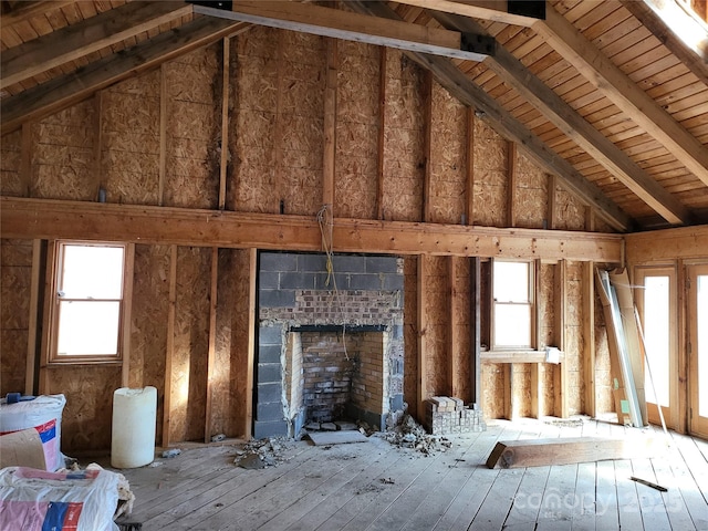 unfinished attic featuring plenty of natural light