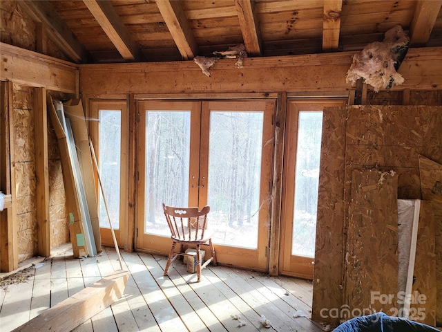 misc room with wood ceiling, french doors, and lofted ceiling with beams