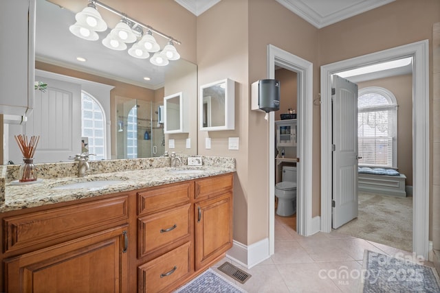 bathroom with a shower with shower door, toilet, tile patterned floors, ornamental molding, and vanity