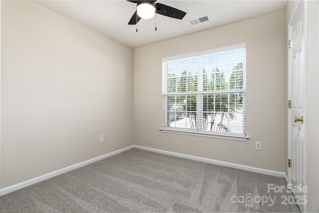 carpeted empty room with ceiling fan