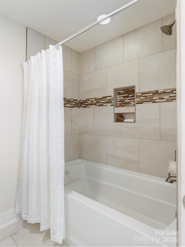 bathroom featuring shower / tub combo with curtain