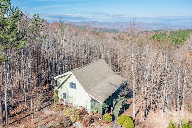 birds eye view of property featuring a mountain view