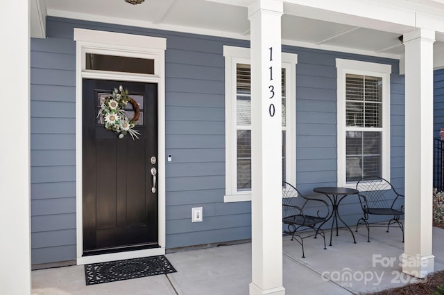 property entrance with a porch