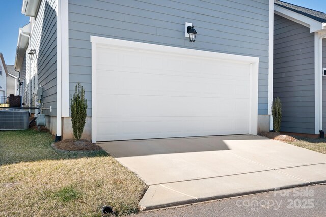 garage featuring central AC unit