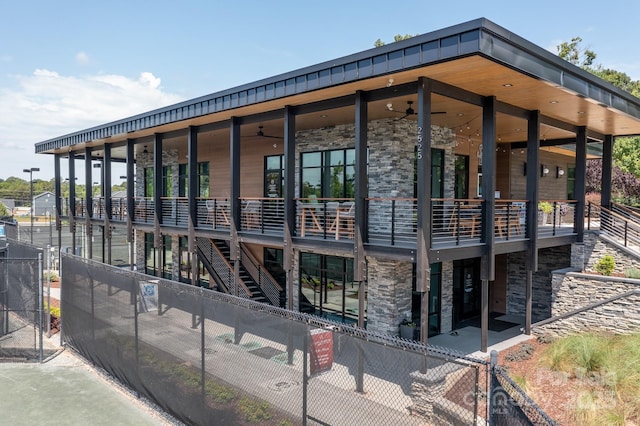 view of home's exterior featuring ceiling fan