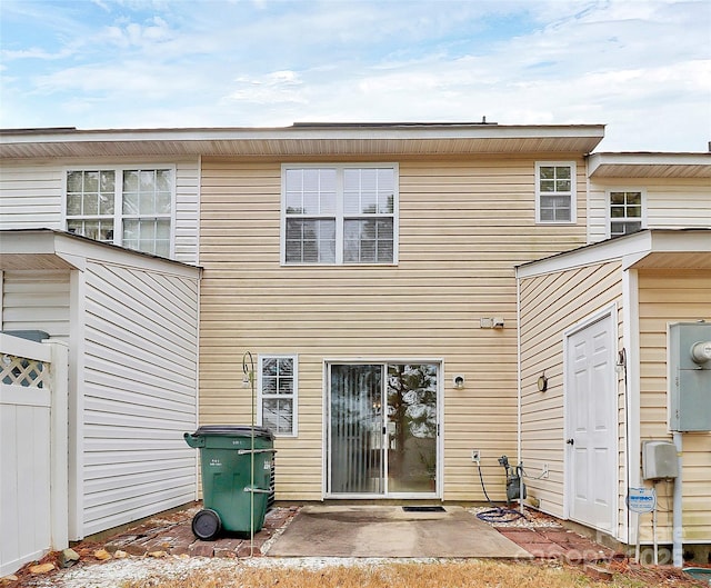 back of house with a patio area