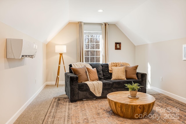 living room with lofted ceiling, carpet flooring, and a wall mounted air conditioner