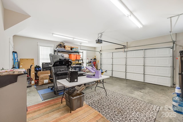 garage featuring a garage door opener