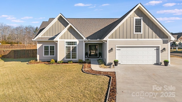 view of front facade featuring a garage and a front lawn