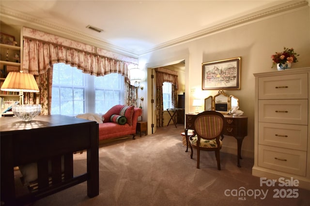 sitting room featuring carpet, visible vents, and crown molding