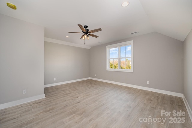 bonus room with lofted ceiling, light hardwood / wood-style floors, and ceiling fan