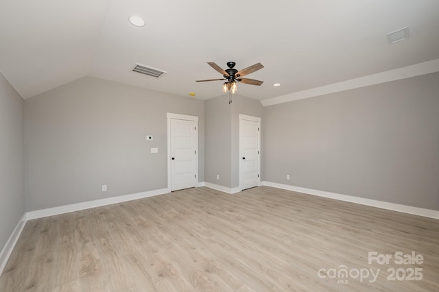 unfurnished bedroom with lofted ceiling, light hardwood / wood-style floors, and ceiling fan