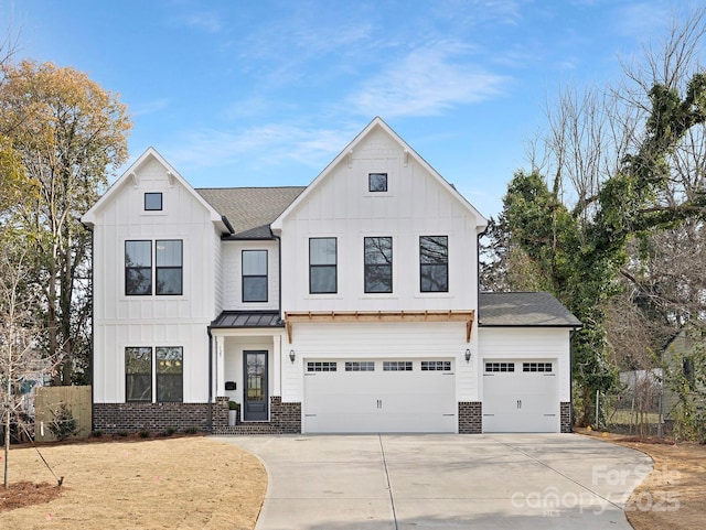 modern farmhouse style home with a garage