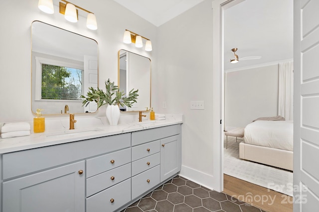 bathroom featuring vanity and ceiling fan