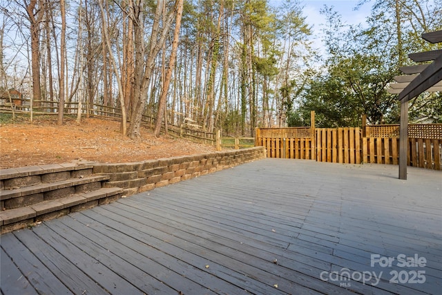 wooden terrace featuring a pergola