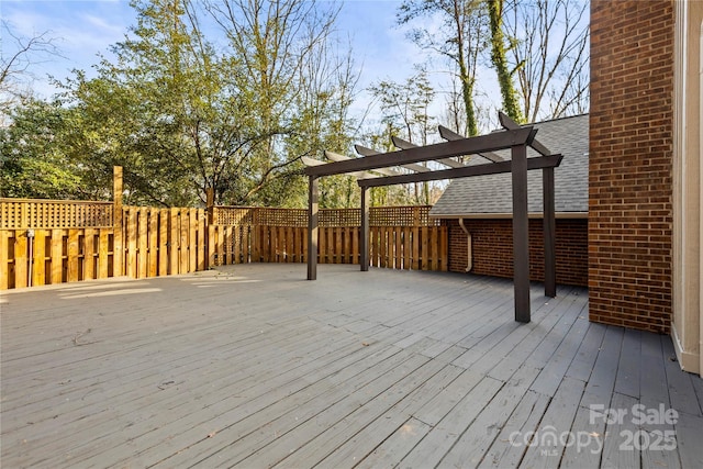 wooden deck featuring a pergola