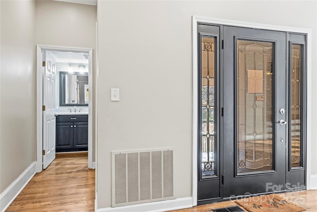 entrance to property featuring sink