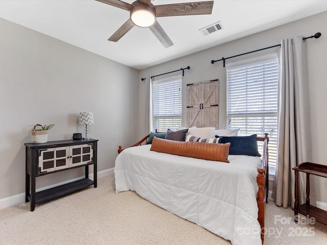 bedroom with ceiling fan and carpet