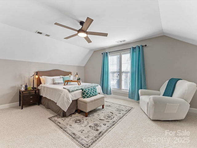 bedroom featuring ceiling fan, vaulted ceiling, and carpet