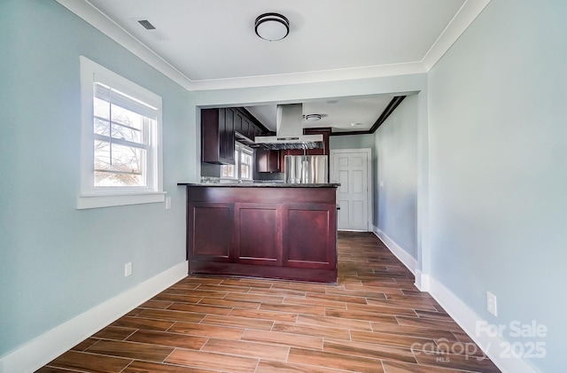 bar featuring ornamental molding, island range hood, and stainless steel fridge