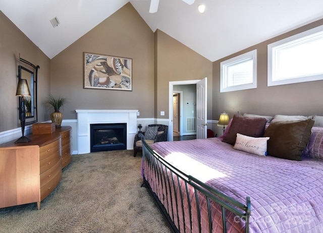 bedroom featuring lofted ceiling, carpet flooring, and ceiling fan