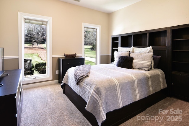 bedroom featuring carpet