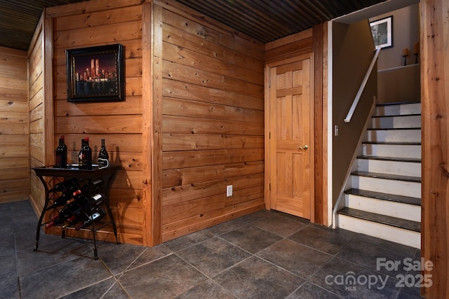 interior space featuring wood walls