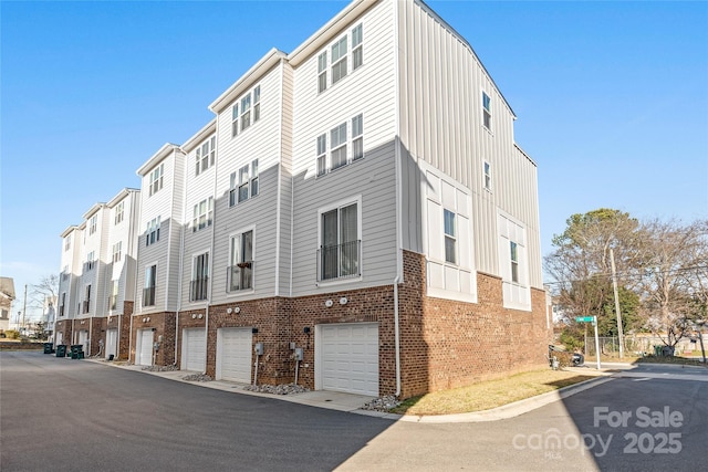 view of building exterior featuring a garage