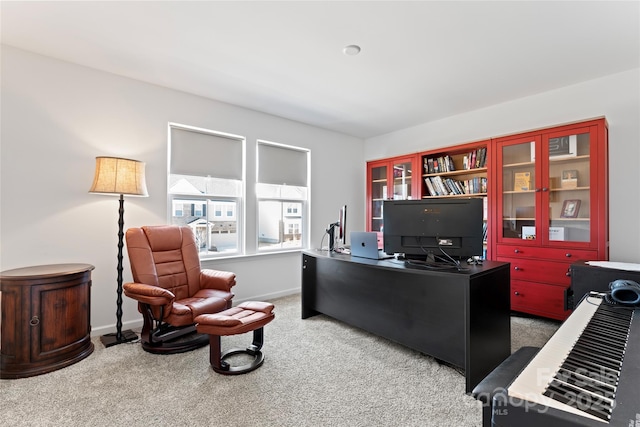 office featuring carpet floors and baseboards