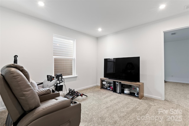 carpeted living room featuring baseboards, visible vents, and recessed lighting