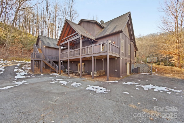 exterior space featuring a wooden deck