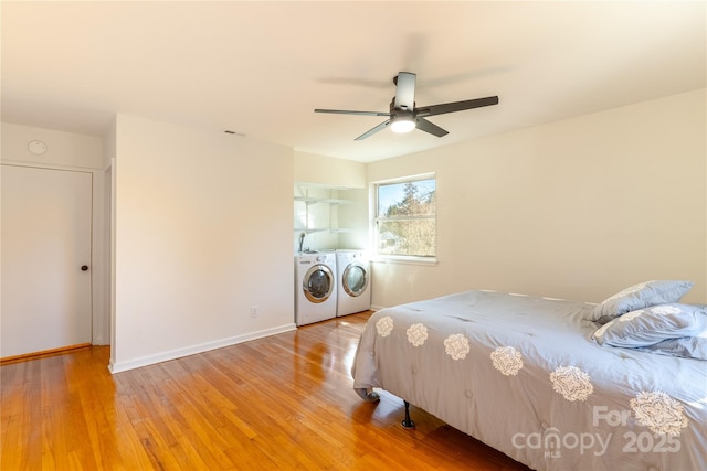 615 Biltmore Ave Unit T7, Asheville, NC 28803 - unfurnished bedroom with a ceiling fan, baseboards, washer and clothes dryer, and wood finished floors