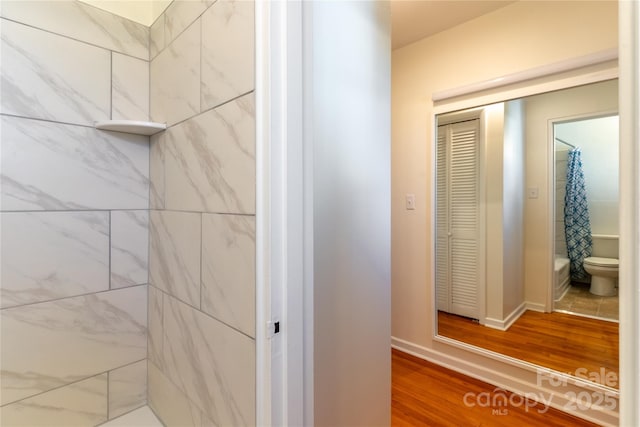 615 Biltmore Ave Unit T7, Asheville, NC 28803 - bathroom featuring wood finished floors, toilet, and baseboards