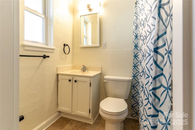 615 Biltmore Ave Unit T7, Asheville, NC 28803 - full bath featuring a textured wall, toilet, tile patterned floors, curtained shower, and vanity