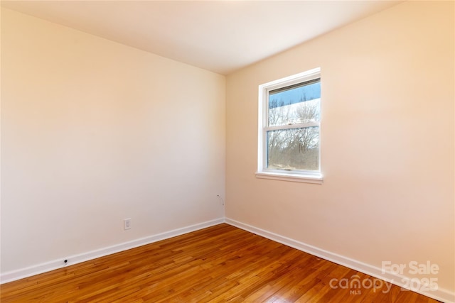 615 Biltmore Ave Unit T7, Asheville, NC 28803 - spare room featuring baseboards and wood finished floors