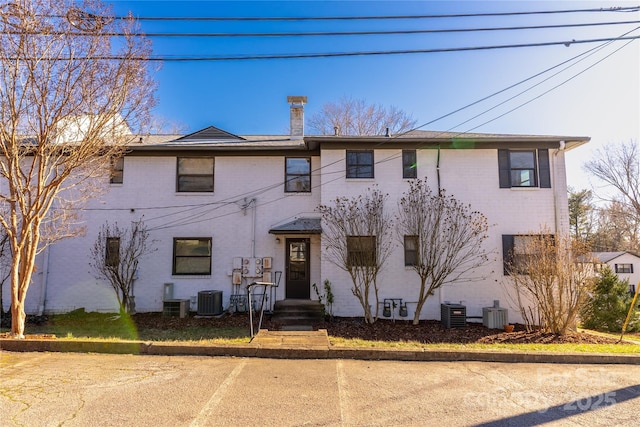 615 Biltmore Ave Unit T7, Asheville, NC 28803 - view of front of house featuring uncovered parking, cooling unit, and brick siding