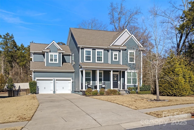 view of front of home featuring a garage and covered porch