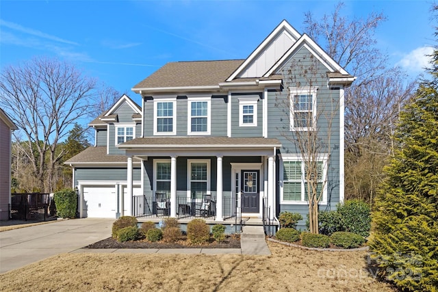 view of front of house with a garage and covered porch