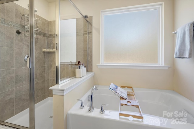 bathroom with independent shower and bath