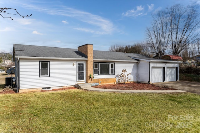 view of front of property with a garage, a front yard, and central AC unit