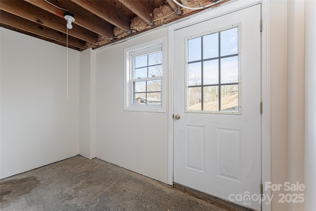 entryway featuring concrete floors