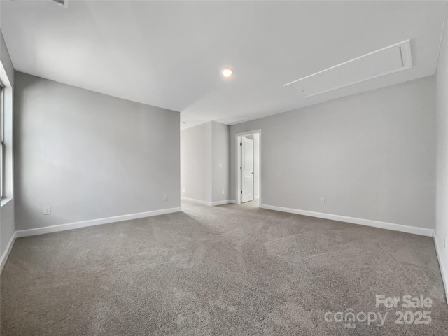 unfurnished room with carpet flooring