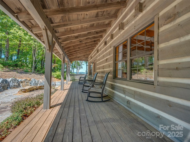 wooden terrace featuring a porch