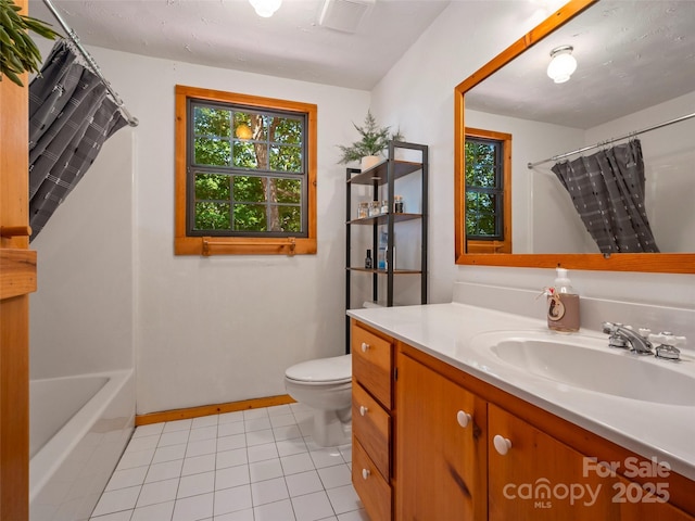 full bathroom featuring vanity, toilet, shower / tub combo, and tile patterned flooring