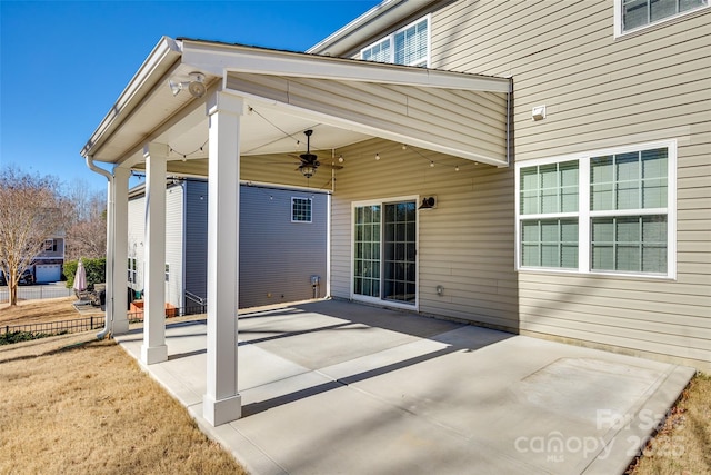 view of patio featuring ceiling fan