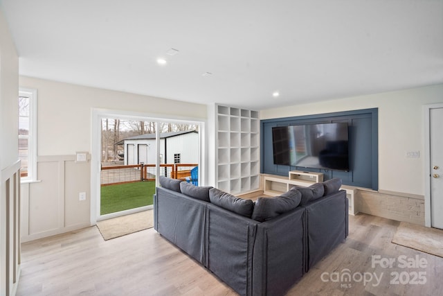 living room featuring light wood-type flooring