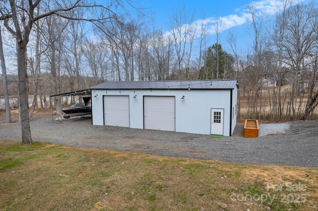 garage featuring a carport