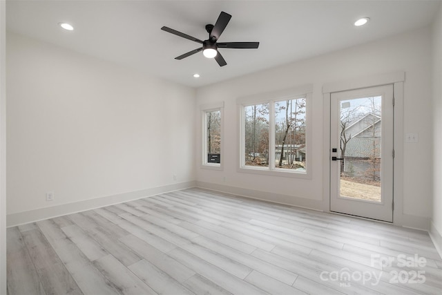 177 Olympia Dr, Mooresville, NC 28117 - unfurnished room with baseboards, light wood-type flooring, a ceiling fan, and recessed lighting