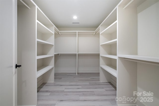 177 Olympia Dr, Mooresville, NC 28117 - walk in closet featuring visible vents and wood finished floors