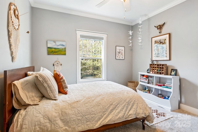 bedroom featuring ornamental molding, ceiling fan, and carpet flooring